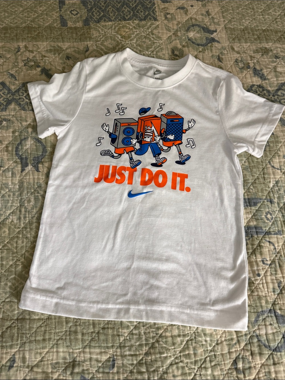 Nike White Tee with Orange 'Just Do It.' and Blue Swoosh